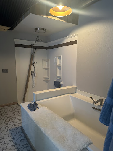 Barndominium master bath with soaker tub and walk-in shower in central Oklahoma