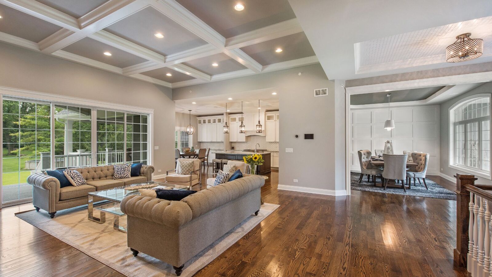 Great room with coffered ceiling in a custom-built home