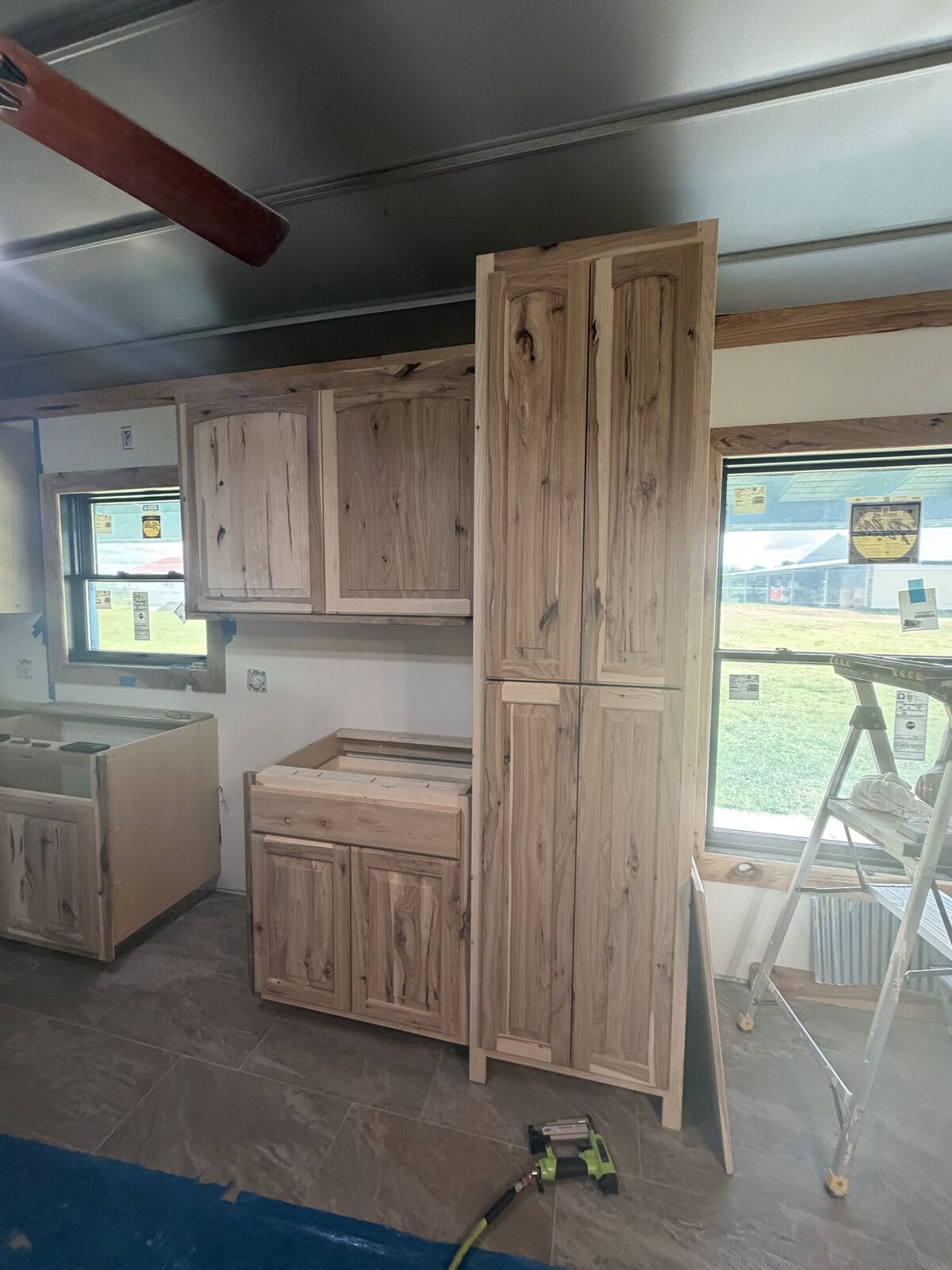 Custom hickory pantry and cabinet installation during a kitchen project near Shawnee, OK
