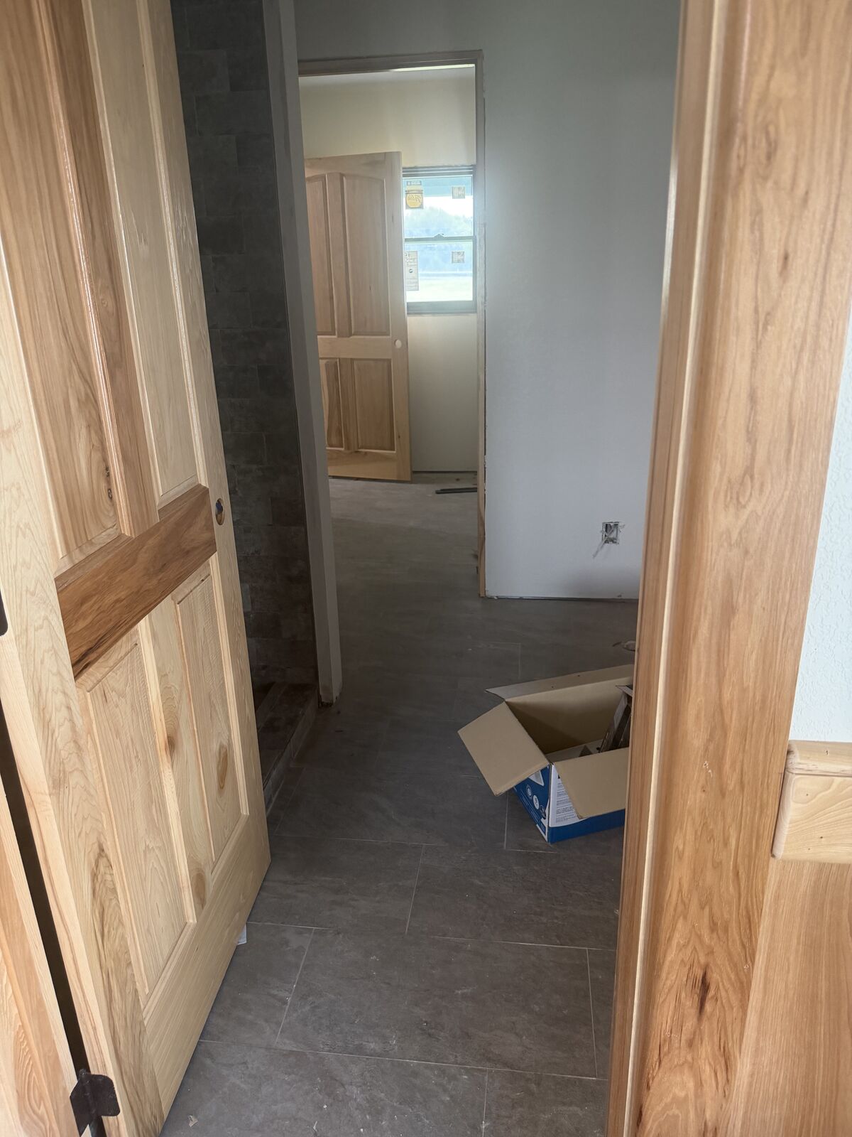 Custom hickory doors and trim carpentry in a new home near Wewoka, Oklahoma